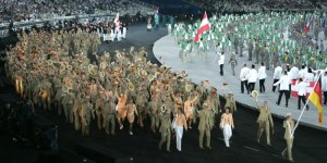 Germanys Ludger Beerbaum carries national flag during opening ceremony of Athens 2004 Olympic Games
