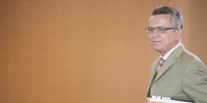 German Interior Minister de Maiziere arrives for the weekly cabinet meeting at the chancellery in Berlin